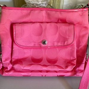 Pink coach signature getaway nylon file crossbody bag with adjustable strap